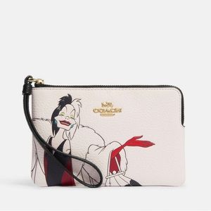 Disney X Coach Corner Zip Wristlet With Cruella Motif